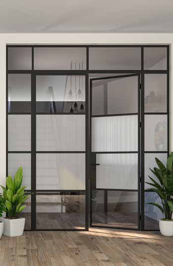 Glazed room divider with reeded glass and a single steel look door